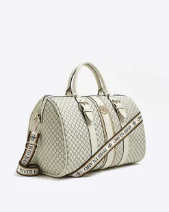 River Island Beige RI monogram travel bag< Bags, Purses & Luggage