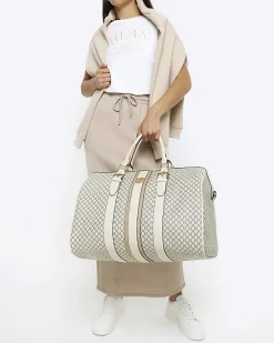 River Island Beige RI monogram travel bag< Bags, Purses & Luggage