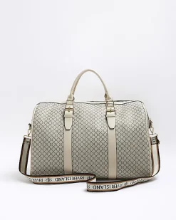 River Island Beige RI monogram travel bag< Bags, Purses & Luggage