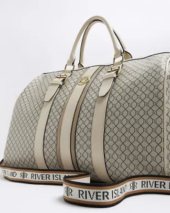 River Island Beige RI monogram travel bag< Bags, Purses & Luggage