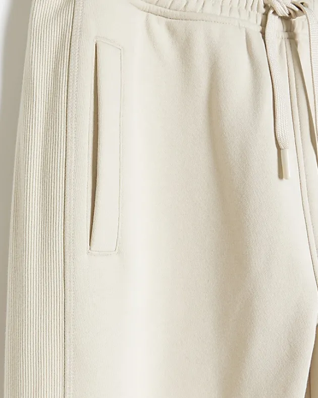 River Island Ecru regular fit rib panel joggers< Tracksuits