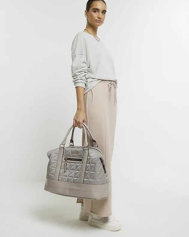River Island quilted zip travel bag< Bags, Purses & Luggage