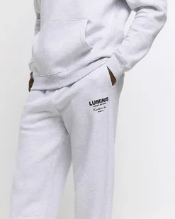 River Island regular fit graphic tracksuit joggers< Tracksuits