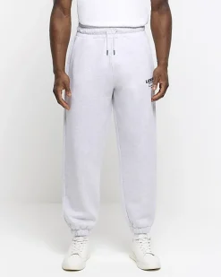 River Island regular fit graphic tracksuit joggers< Tracksuits