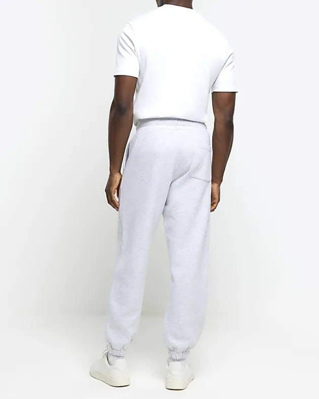 River Island regular fit graphic tracksuit joggers< Tracksuits