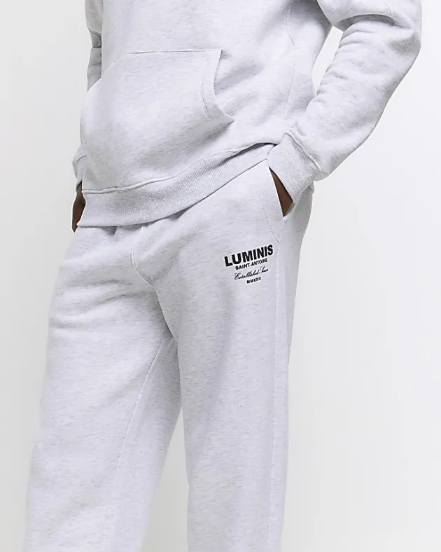 River Island regular fit graphic tracksuit joggers< Tracksuits