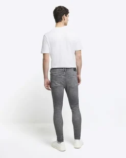 River Island super skinny spray on faded jeans< Jeans