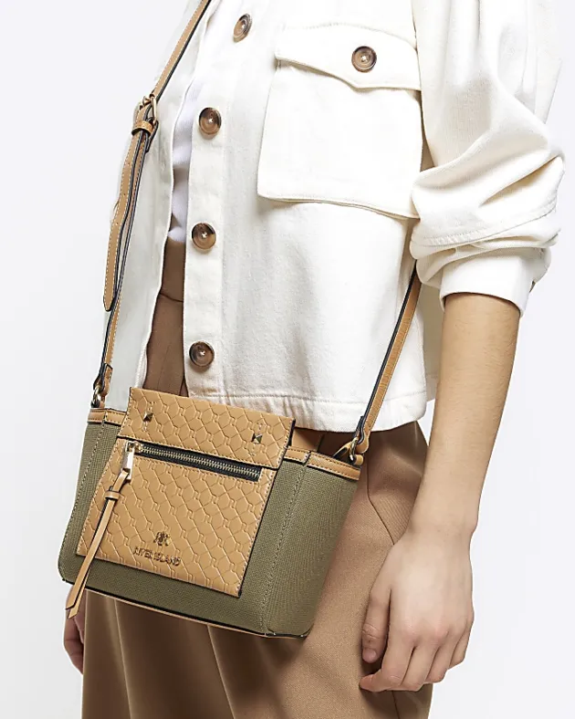 River Island canvas embossed RI cross body bag< Bags, Purses & Luggage