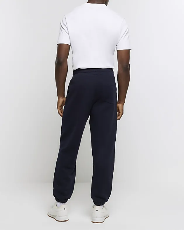 River Island Regular Fit Graphic tracksuit Joggers< Tracksuits