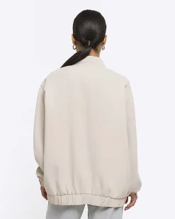 River Island Petite beige oversized bomber jacket< Petite