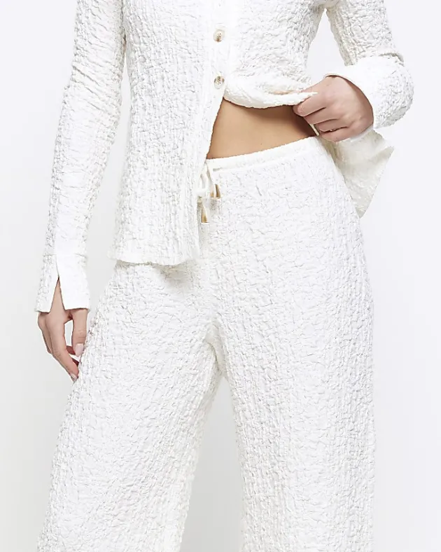 River Island Petite textured wide leg trousers< Petite