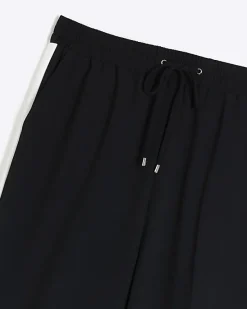 River Island Plus side stripe wide leg joggers< Plus