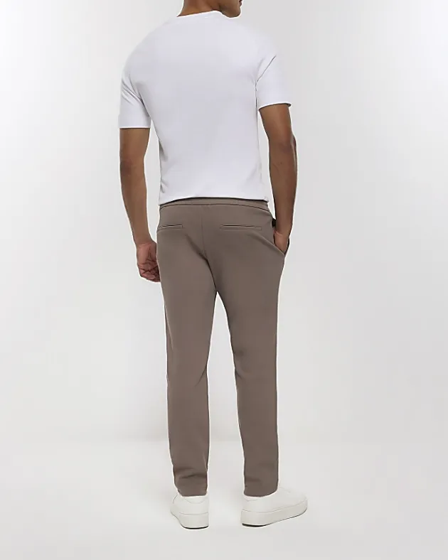 River Island slim fit twill pull on smart joggers< Trousers